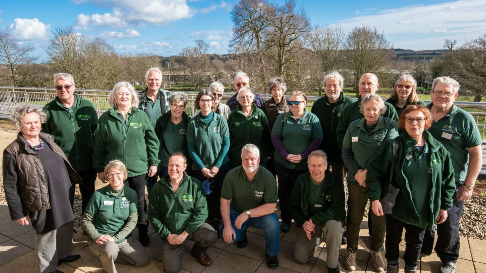 Master Composters stood smiling in Garden Organic Uniform